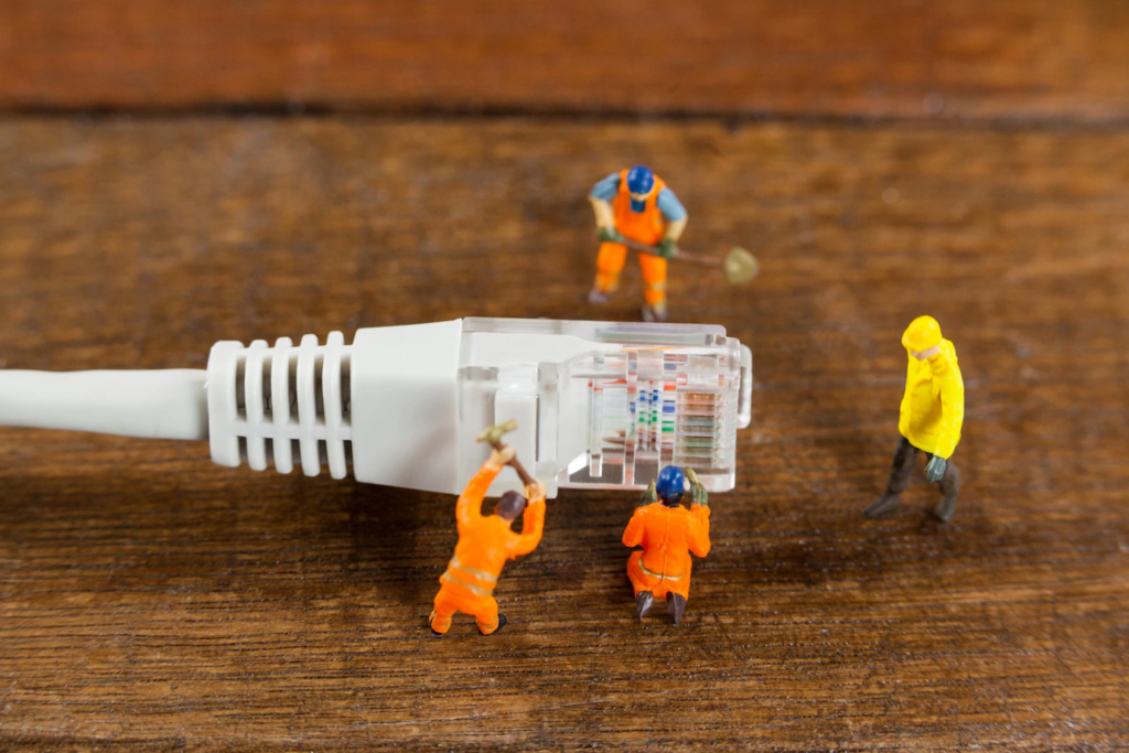 Toy installers working on a cat 5 cable
